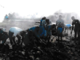 N S S Volunteers during volunteering odd job and labour work in adopted village.